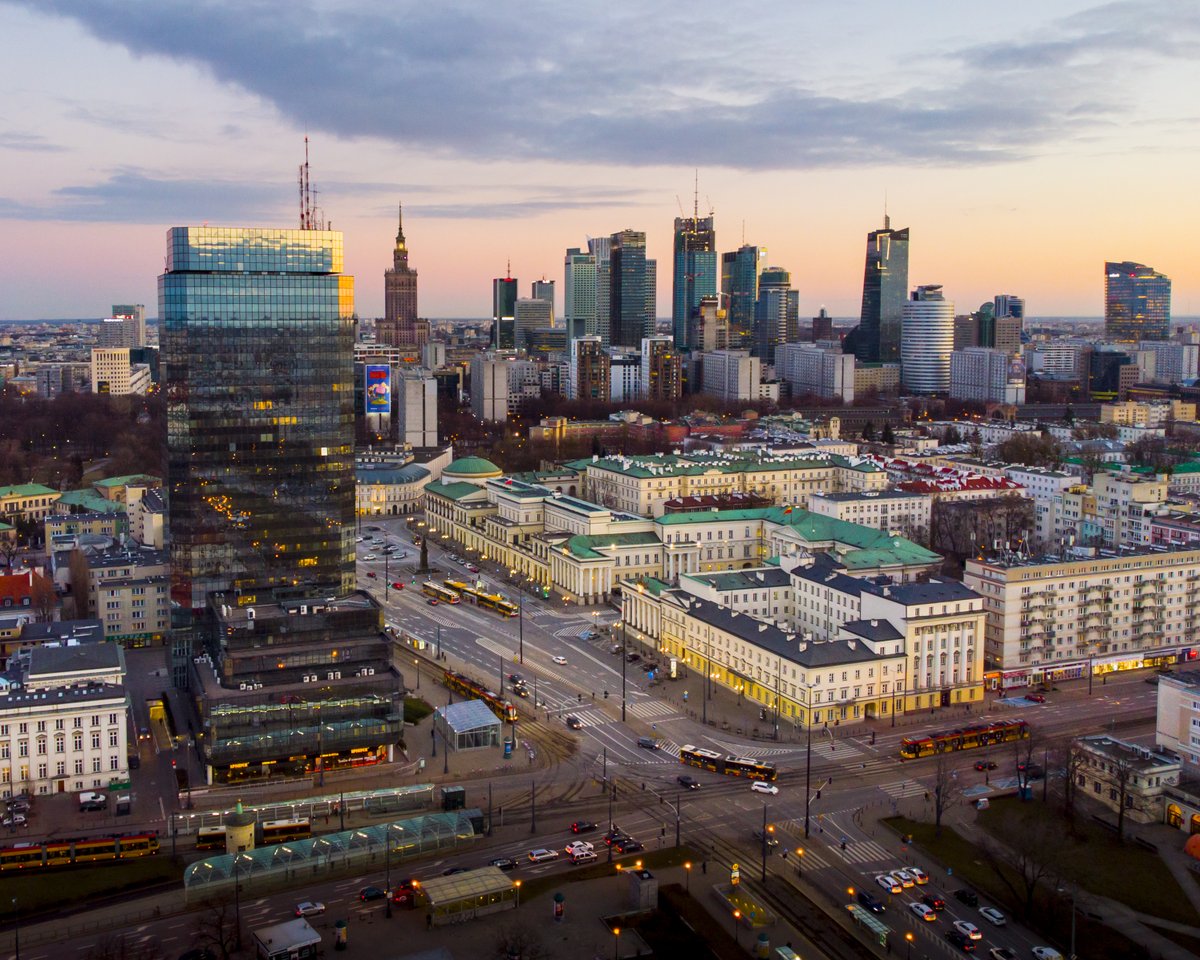 View from drone over Bankowy Square with skyline in the background.