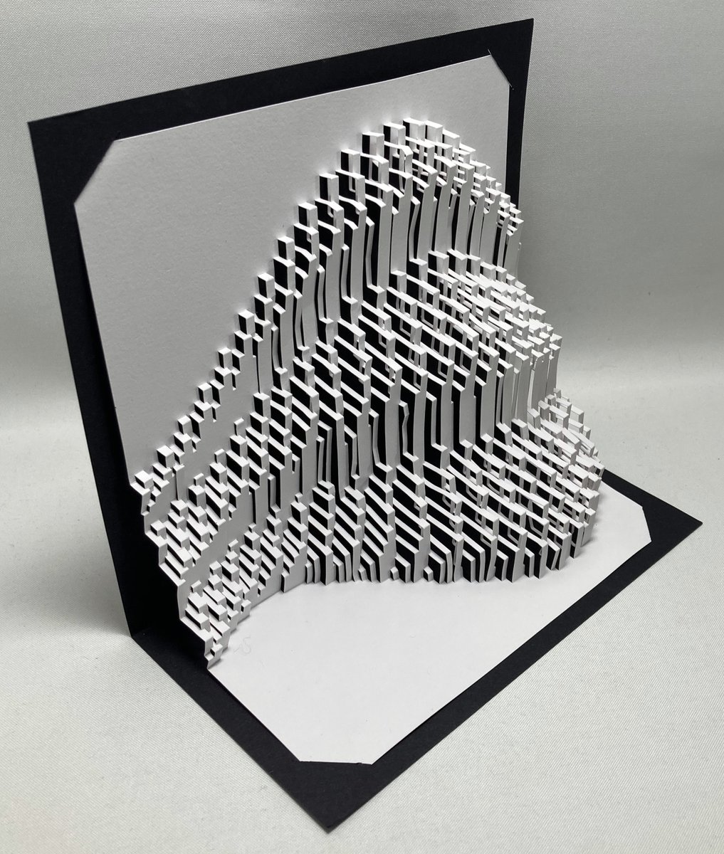 Ullagami's tweet photo. Playing with shapes.  This one looks more garlicky than I had anticipated. #ullagami #kirigami #origamicarchitecture #popup #origami #papercraft #mathart #paper  https://t.co/dOhca3vF5N https://t.co/hWeZhvsJbg
