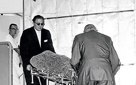 Dr. Noguchi did the autopsy. also known as the "coroner to the stars", he would later do RFK's autopsy. let's just say there are very valid reasons to doubt his motives and the conclusions he came to, lol