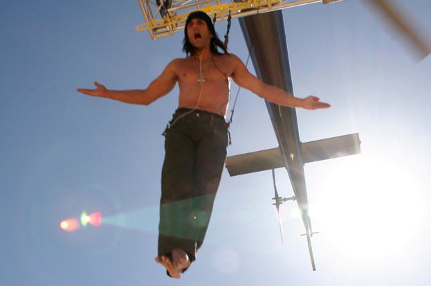 criss angel helicopter fish hook Criss Angel doing a hook suspension from a helicopter winding over a desert  crevasse, arms wide like Christ, crying and screaming AAARRGHH!! while  listening to Korn on his ipod is the energy