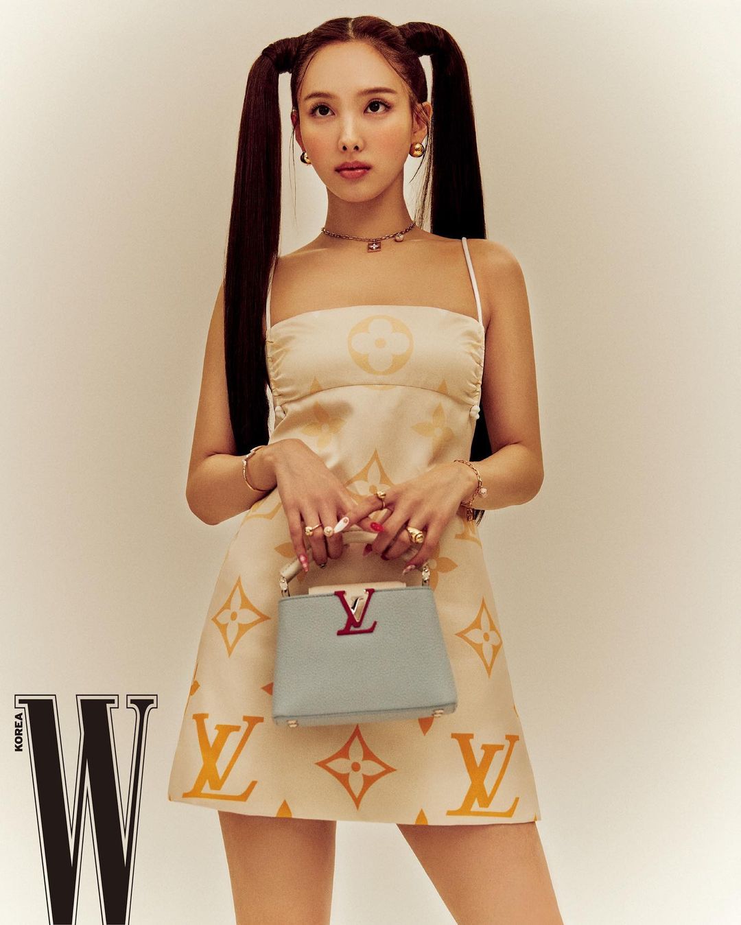 Louis Vuitton on X: A beacon of sunshine. As captured in @WKorea,  @JYPETWICE K-Pop singer #Nayeon wears a dress from #LouisVuitton's Summer  2021 Collection by @TWNGhesquiere. #LVEditorials  /  X