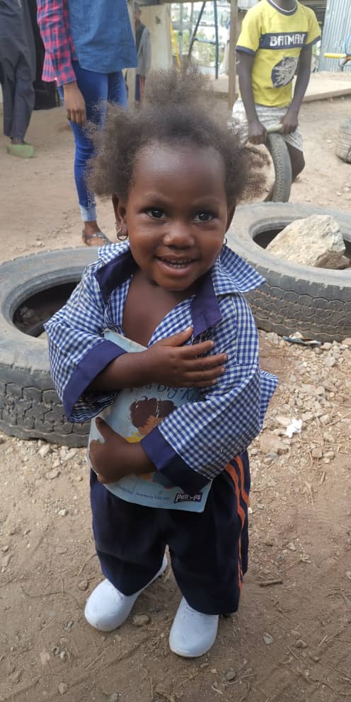 nfischool's tweet photo. Meet the tenacious little Amatala Musa! Amatala is not our student, her siblings are but every now and again we would notice her hang around school premises under the sun with a book, we have spoken to her mom about this. Please note; We are not currently admitting students. https://t.co/7eeMiLF5SL