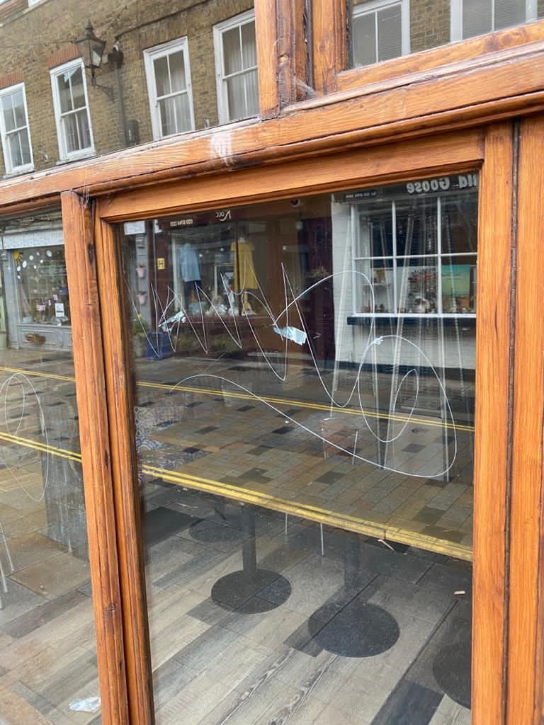Terrible and very shocking news from our good friends &amp; neighbors Osteria Pulcinella. They has this horrific vandalism scratched onto their windows last night. Why in this particular time when things are so bad for everyone, do senseless and hateful people do this to others?