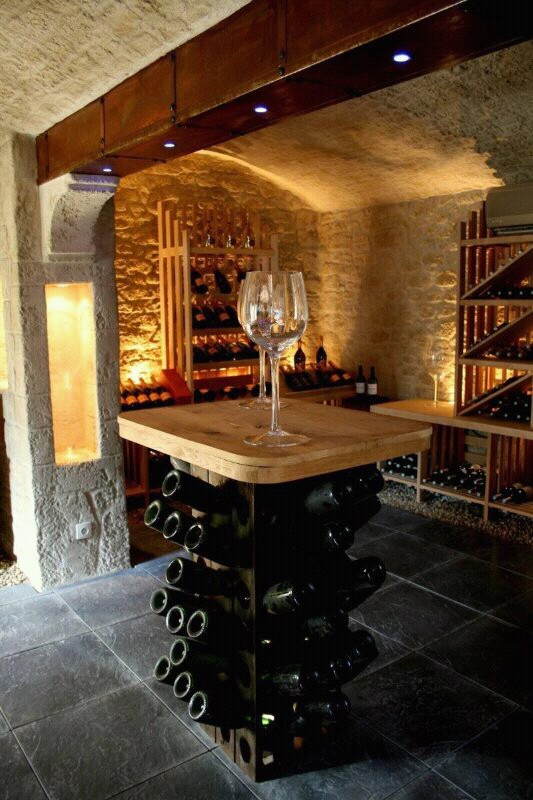 Wine !!!!! You are a winerist and don't have your own cellar/cave. Any room anywhere can be a stone vaulted  dream. From £10,000 complete.