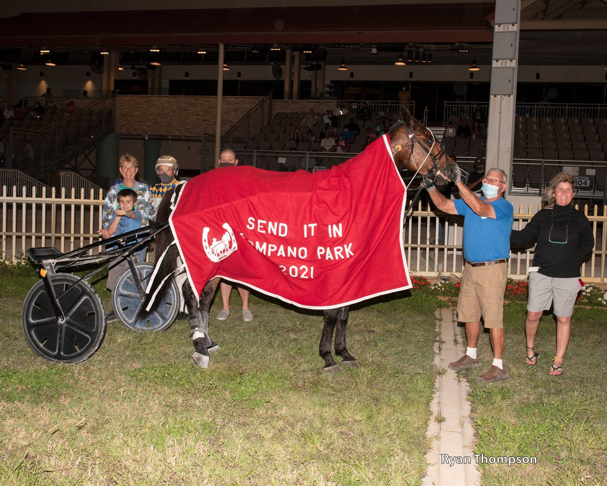 FIST FIGHTER and Wally Hennessey winning the #SendItIn Invitational Trot last night <a href="/IsleRacingPP/">Pompano Park Racing</a>