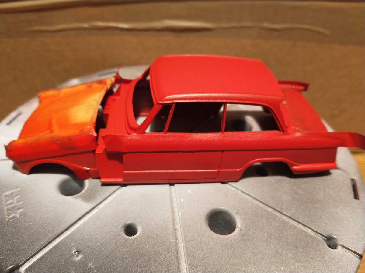 As expected, not an unalloyed victory, but, where it worked, it worked well. The top of the boot is a disaster, though. Memo to myself: on masking, better to mask more than less. Easy to paint dark on light, but where the red's leaked onto the white, it'll be a bugger to cover.