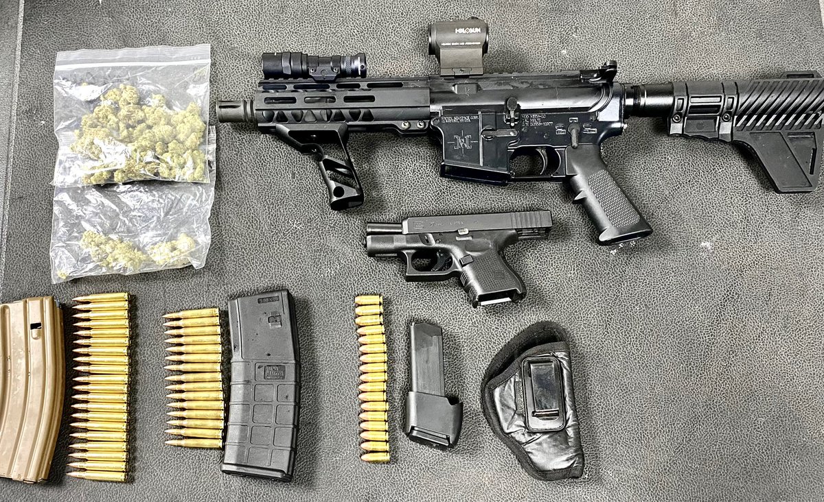 MiamiBeachPD's tweet photo. LICENSE PLATE READERS: MBPD arrested 32-year-old Steven Boue after driving through our LPR’s on the Julia Tuttle with no tag. When officers stopped him they observed marijuana and firearms in plain view. Boue was arrested and charged with multiple felonies. #MBPDprotecting https://t.co/WsBo1ENapX