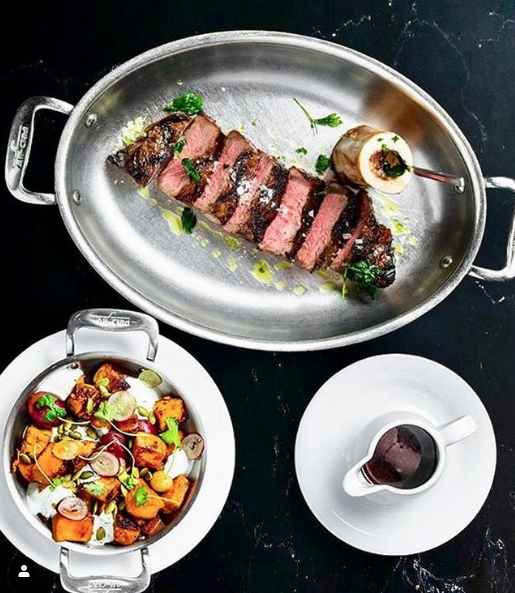 Dinner is served: <a href="/Chef_MarkMcEwan/">Mark McEwan</a>'s strip loin steak served with house herb &amp; garlic rub and roasted bone marrow!