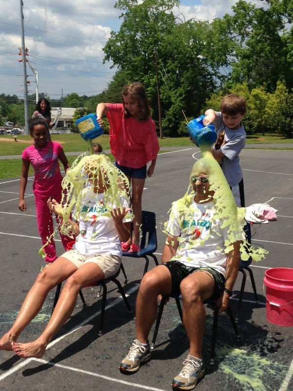 bdevore7's tweet photo. One of my favorite Field Day memories was getting slimed at the end of it with @nancy_janas as part of @KidsHeartChall celebration. Kids enjoyed seeing us get coated for reaching their goal! #OPENAllWeek #NationalFieldDay https://t.co/8rNCFDz0vo