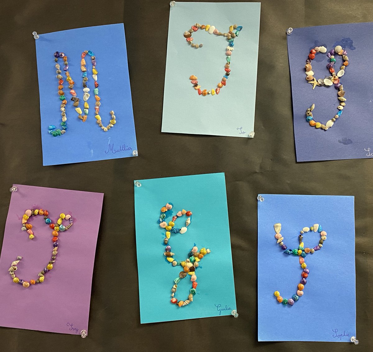 isblib's tweet photo. "ABCDEFG...tell me what you think of me" -- and of my gorgeous cursive letters decorated with colorful beads and seashells? This amazing alphabet created by our ISB Kindergarteners looks more like beautiful jewelry! #cursive #cursiveletters #cursivewriting #letters #lettre #ISBOS https://t.co/yxOVoTMsFp