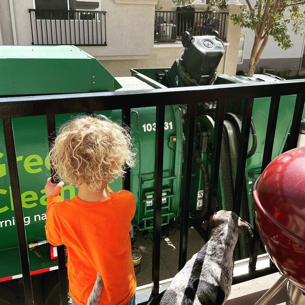 WasteManagement's tweet photo. Tuesday pickups are so much more fun when we have this #WMFanofTheWeek cheering us on from the sidelines! Does your little one excitedly wait for pickup day? Use the hashtag #WMFanPhotos to share those special moments with us. https://t.co/BfclNwlBx2