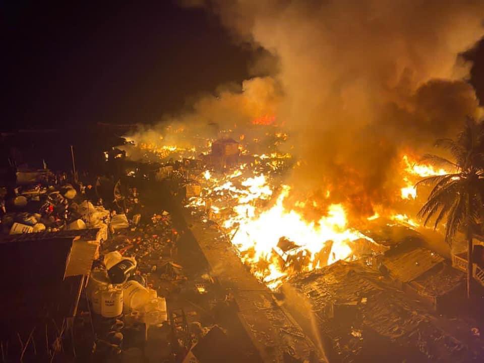 WharfKids's tweet photo. Desperately sad - huge fire ripped through Susan’s Bay two nights ago. Not Magazine Wharf thankfully, but are tragic reminder of the fire risks in these unplanned and overcrowded housing areas. Thoughts with all those affected. https://t.co/SNF96XF6Kn