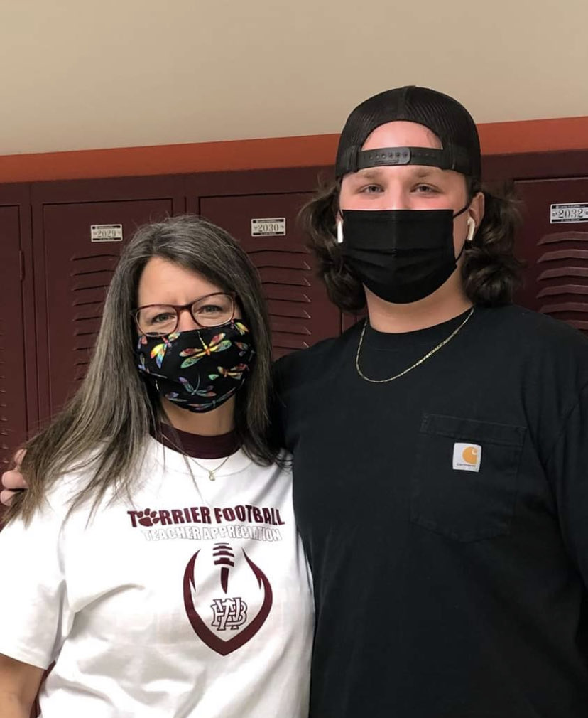 CoachBradLutz's tweet photo. Senior Day is tomorrow and our senior football players recognized one of the many teachers who made a huge impact of their time at WBHS. Thanks to ALL of our teachers at WBHS and the powerful influences they make on our students. #ProtectTheTeam https://t.co/yrDhNvZvQc