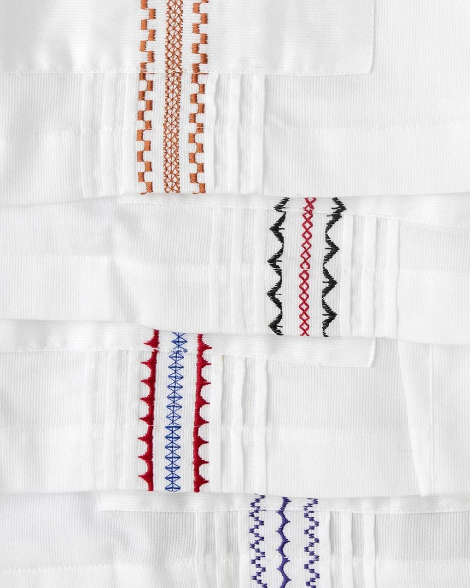 Show your team spirit with game day guayaberas from @dos_carolinas. Designer Caroline Matthews encourages guests to choose colors, fabric, and construction details for a custom guayabera that fits perfectly and is completely unique.