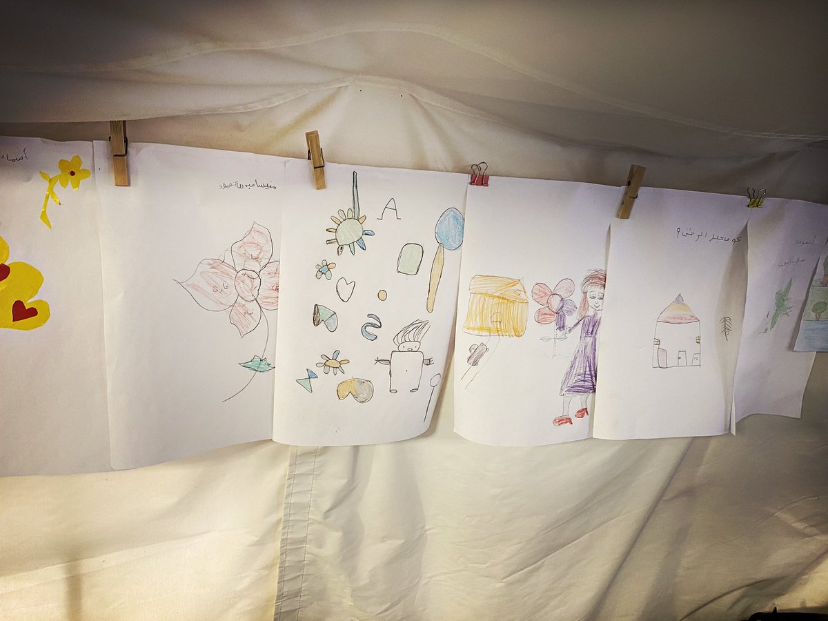 FCarboniICRC's tweet photo. My day in #AlHol camp -mud, wind, rain, collapsed tents, kids behind barbed wire, violence 

Then these children’s pictures - their hopes and dreams so different to what the world is offering. https://t.co/7EQmIJGC3M