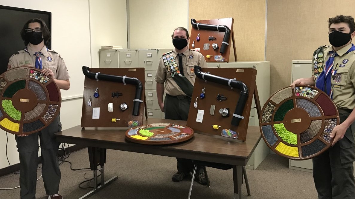 SpEdOUSD's tweet photo. 📢Shout out to Nathaniel for his amazing🦅service project. He created sensory boards for our students at Canyon Hills School.👏 We received 7 tactile boards and 7 activity boards! @OrangeUnifiedCA #sensoryboards #eaglescout https://t.co/hcoefck0ti