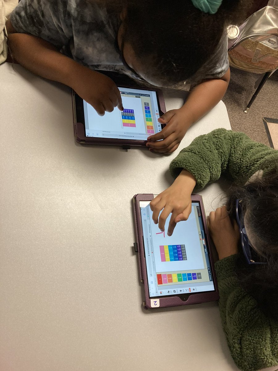 hawks_harris's tweet photo. Harris students in Ms. Stewart’s 4th grade class using our new Title I iPads and the math app BrainingCamp to explore and gain a deeper understanding of fractions! @GPS_District https://t.co/svVLVz5edx