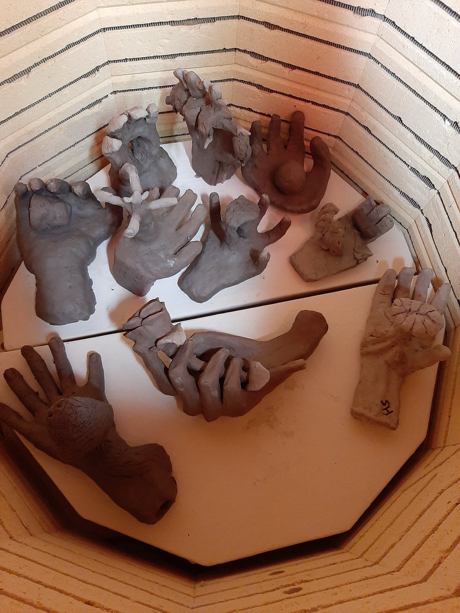 resykalski's tweet photo. 8th grade made some ceramic hands that told a story through symbolism last week. @clintonwischool #BeCougarProud https://t.co/kQQ59hii7U