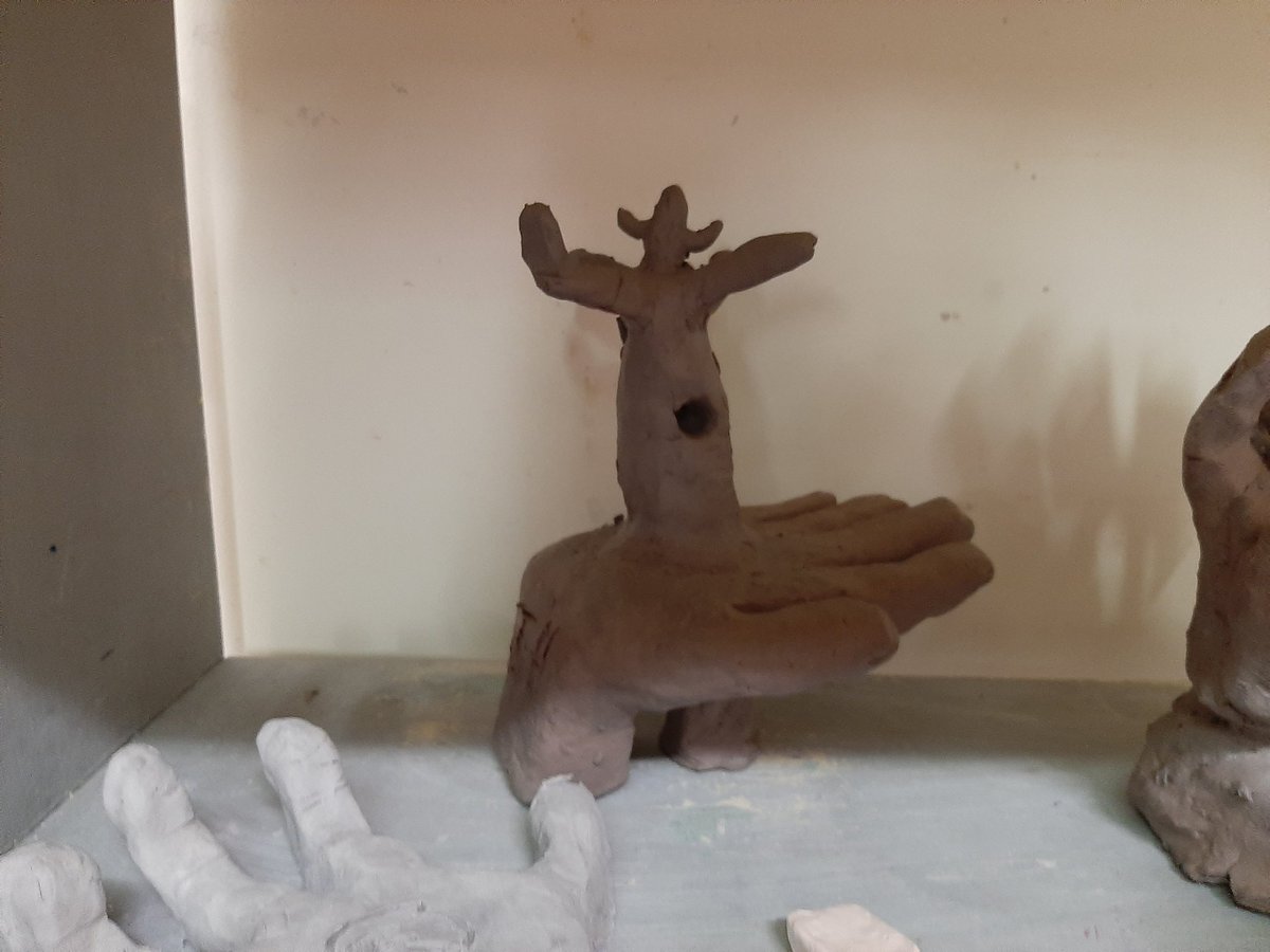 resykalski's tweet photo. 8th grade made some ceramic hands that told a story through symbolism last week. @clintonwischool #BeCougarProud https://t.co/kQQ59hii7U