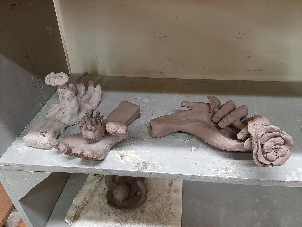 resykalski's tweet photo. 8th grade made some ceramic hands that told a story through symbolism last week. @clintonwischool #BeCougarProud https://t.co/kQQ59hii7U