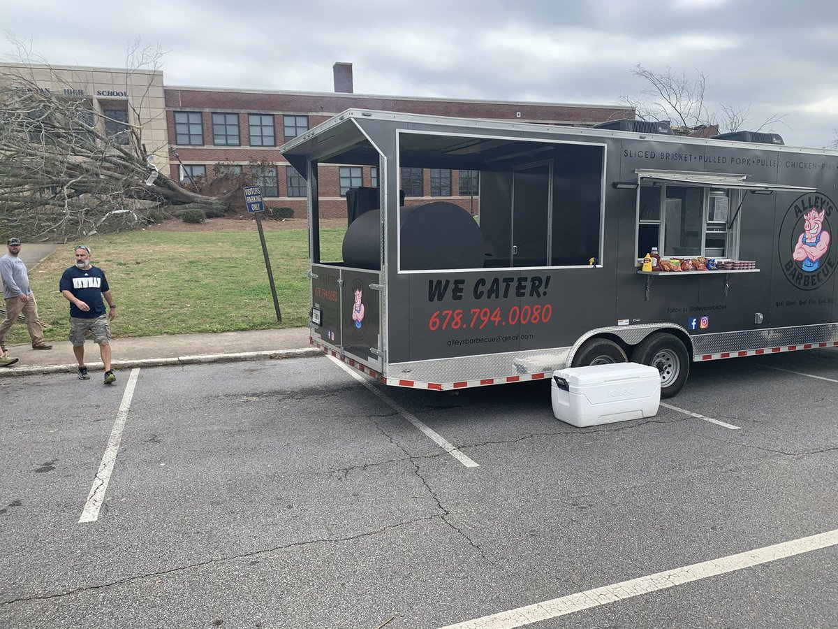 WeAreNewnan's tweet photo. Coach Alley and the guys have moved the truck to the high school. If you've been out all day helping, are without electricity, out of your home, or for any reason could use a meal please come by! #OneNewnan https://t.co/LmefL6IP6E
