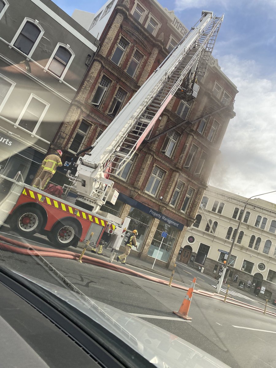SallyBoult's tweet photo. Building fire Dowling st and vehicle fire outside New World DunedinNz https://t.co/v3myxI31p5
