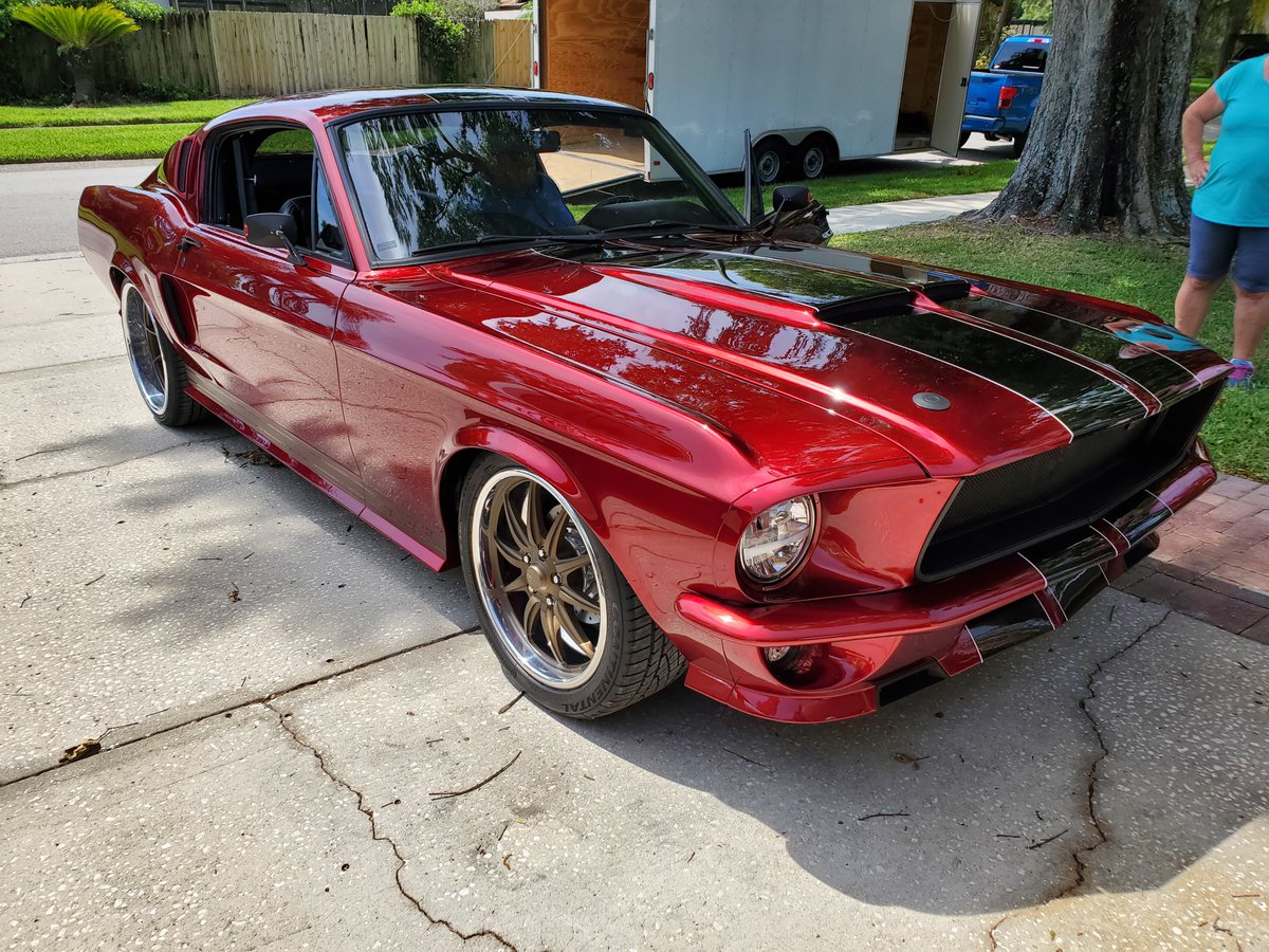 DrChrisR's tweet photo. Took delivery today of the '67 Fastback from the BEST custom car builder EVER! It's been a long 2 year build! This car is a rolling piece of art work. He themed the car as a tribute to my 33 year career with Fire-Rescue. THANK YOU STEVE!!!!! πΊπΈπΊπΈπΊπΈπ
#Shinescustoms
#Ford https://t.co/sL4lbaGAXf