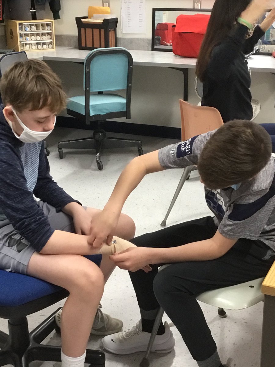 SCMS466MKough's tweet photo. Working towards emergency preparedness with 6th grade FACS, students created mini first aid kits (one of my favorite projects) and got to practice CPR.  That’s not all, either!  They also spent some time practicing their wrapping skills.  #firstaid #thatsawrap https://t.co/pRhLqkHvHN
