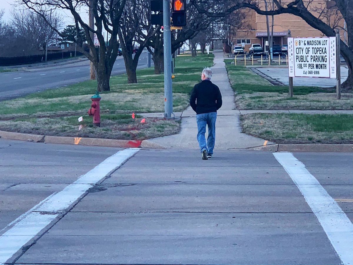 TheOpenBrooke's tweet photo. #BREAKING: Kansas Senator Gene Suellentrop has bonded out of jail. 

He had no ride upon leaving the jail. 

I asked him dozens of questions, he never once acknowledged me or said anything.

He appears to be walking back to the Kansas Statehouse now. https://t.co/ObRNwOfx4N
