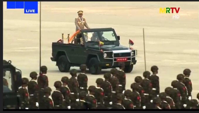 poppymcp's tweet photo. #Myanmar army chief Min Aung Hlaing has arrived at the Armed Forces Day parade in Naypyitaw, to the sound of a brass brand. Last night, state media warned protesters against his coup would be shot in the head.

#WhatsHappeningInMyanmar https://t.co/y5NKLLOcNw