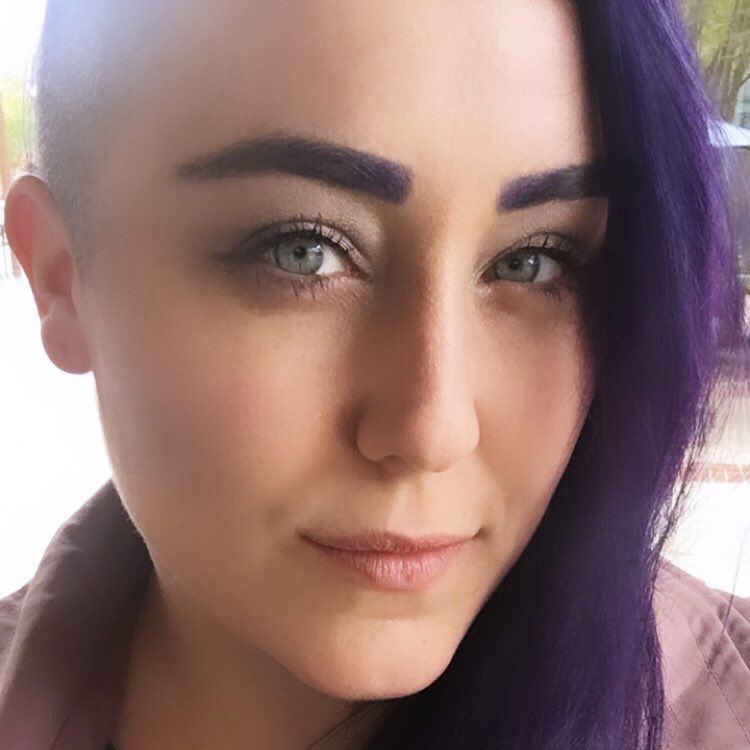 alkalinered's tweet photo. @TheSigularity @CircuitSwan definitely not, not in the slightest. i had half my head shaved for 7 yrs, burgundy for 2, now purple for 3. im a senior member of my team and present to directors/VPs regularly; in my previous role i often worked with VPs and CEOs. (old pic, i’ve grown the side in during covid) https://t.co/OLOvnbe4si