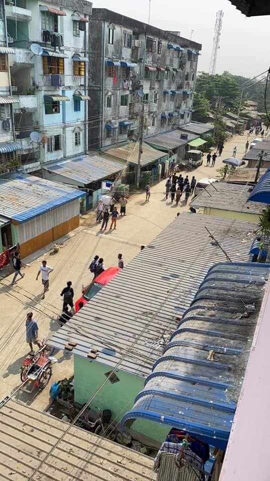 IrrawaddyNews's tweet photo. At least two civilians were seriously injured as junta forces dispersed anti-regime protesters at the Yuzana Garden Housing complex in Yangon’s Dagon Seikkan Township on Mar. 27 using live ammunition and stun grenades. (Photo: CJ) #WhatsHappeningInMyanmar https://t.co/gANAuppWj6
