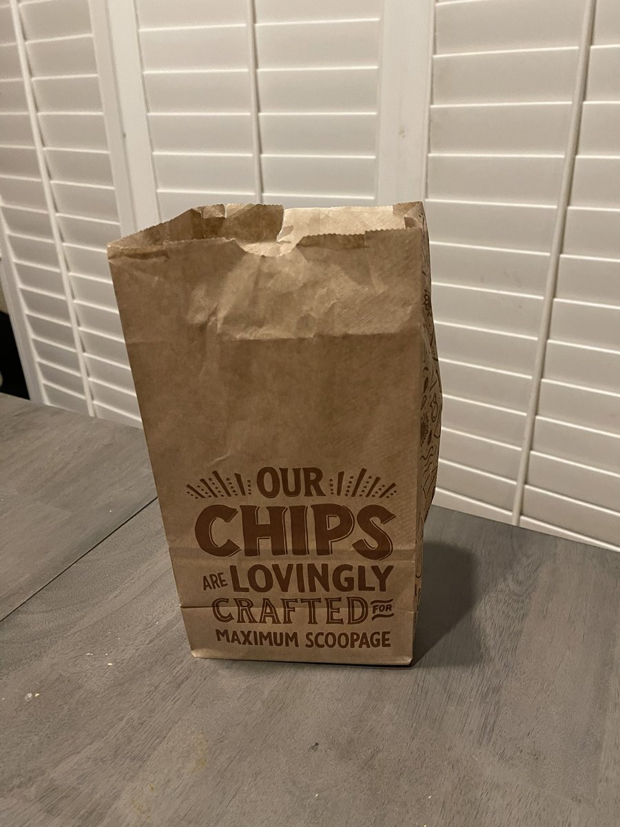 TheRealRosner's tweet photo. @ChipotleTweets getting stingy tonight in Carlsbad. They could only do a small cheese portion since they “ran out”? And this was the bag of chips we paid for... https://t.co/dHSgqniKKG