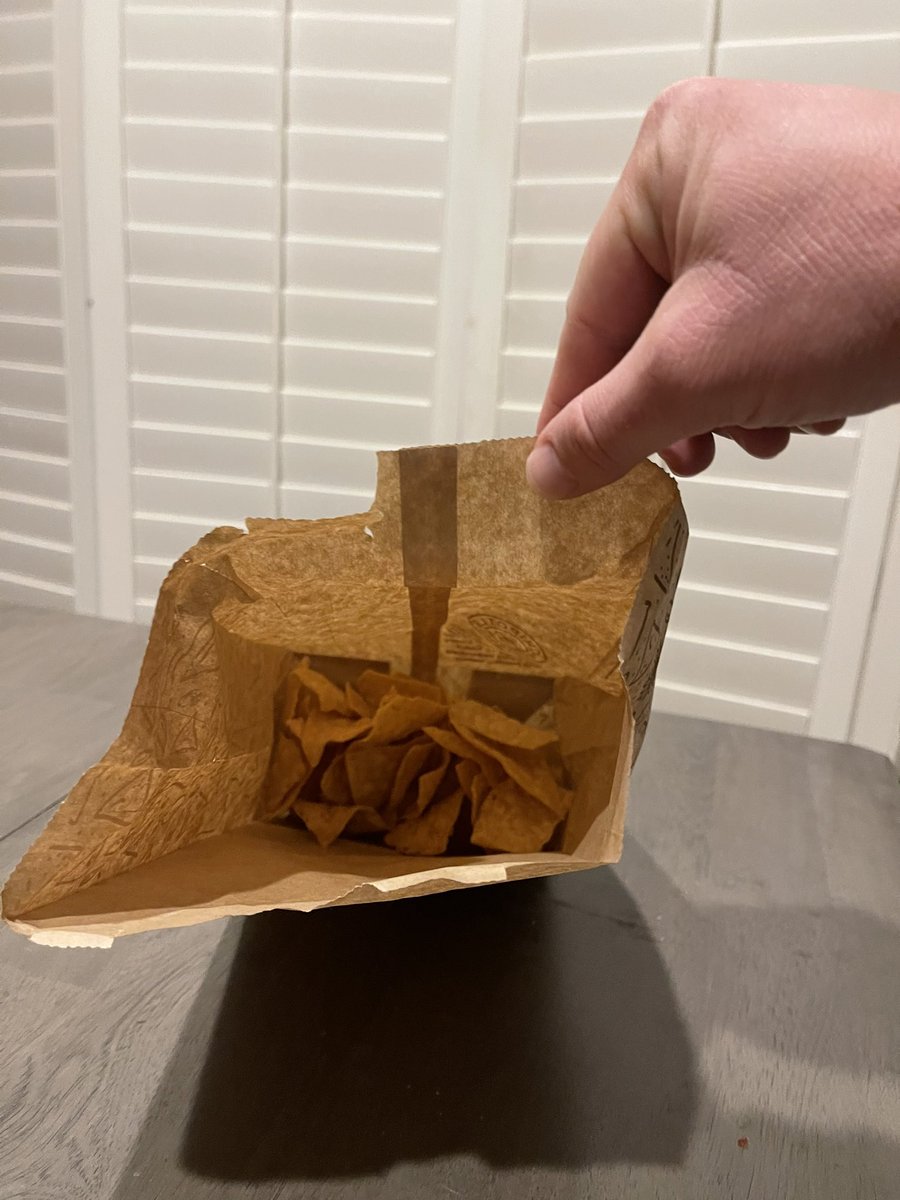 TheRealRosner's tweet photo. @ChipotleTweets getting stingy tonight in Carlsbad. They could only do a small cheese portion since they “ran out”? And this was the bag of chips we paid for... https://t.co/dHSgqniKKG