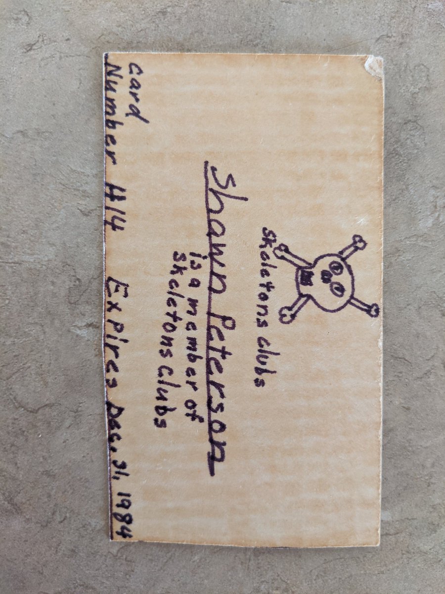 This is urgent! The Skeletons Club is trying to locate Shawn Peterson. This card was found in a closet and that's not okay.