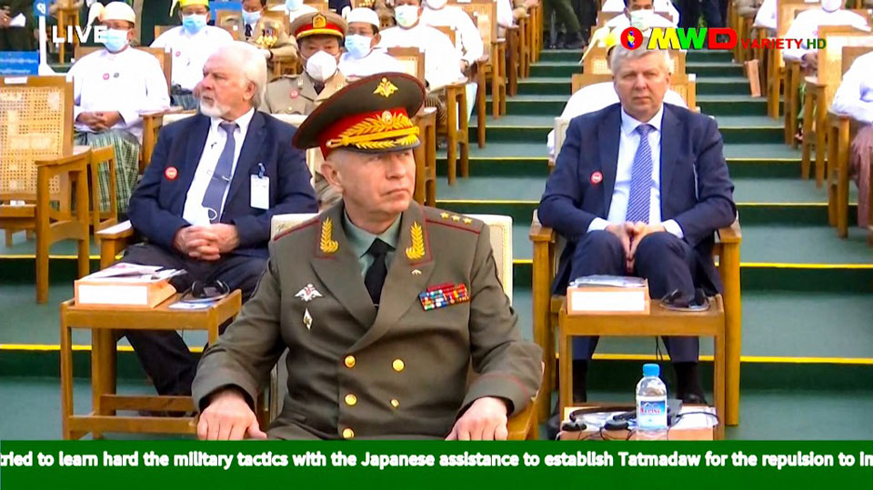 MizzimaNews's tweet photo. This screengrab provided via AFPTV and taken from a broadcast by Myawaddy TV in #Myanmar on March 27, 2021 shows Russia's deputy Defence Minister Alexander Fomin (C) attending an annual parade put on by the Myanmar military to mark Armed Forces Day in the capital Naypyidaw. AFP https://t.co/h45gA91too