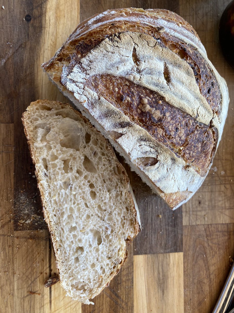 nuttycow's tweet photo. No idea what I’m looking for in a crumb but this looks ok #saturdaybake #sourdough https://t.co/rFJBsf8sTe
