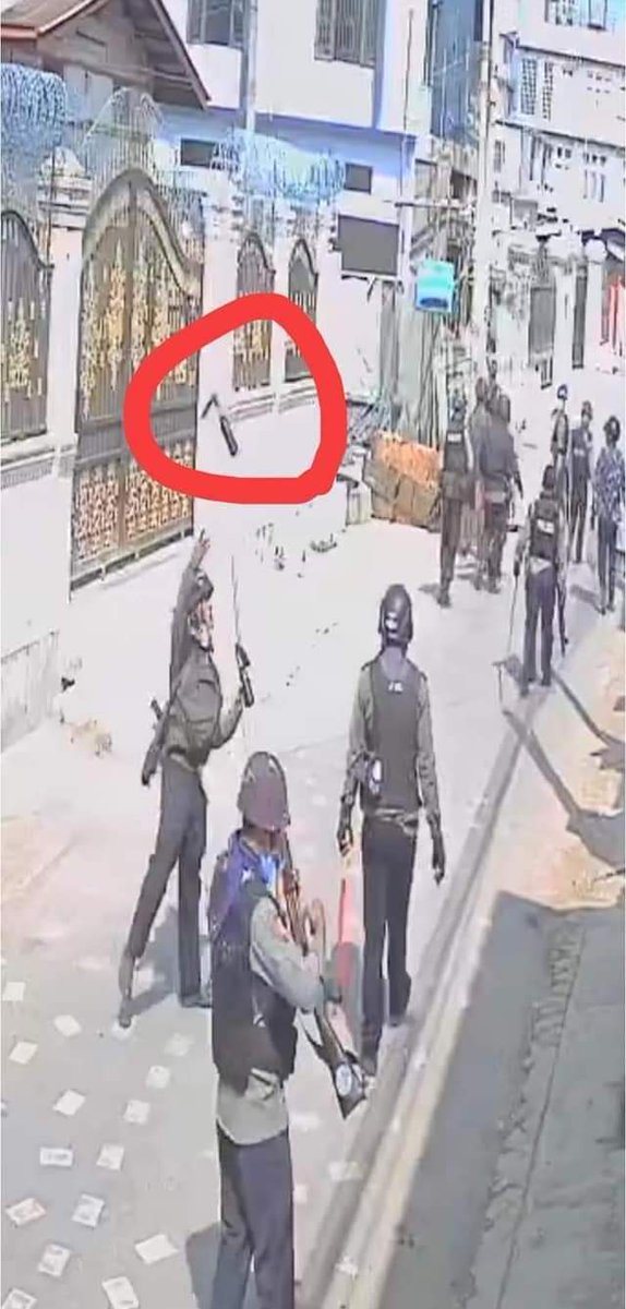 WathanO479's tweet photo. A terrorist policeman was throwing a molotov cocktail to peaceful protesters in TaungGyi today. 

#WhatIsHappeningInMyanmar 
#CrimesAgainstHumanity 
#SaveMyanmar https://t.co/Js7uj9dOL9