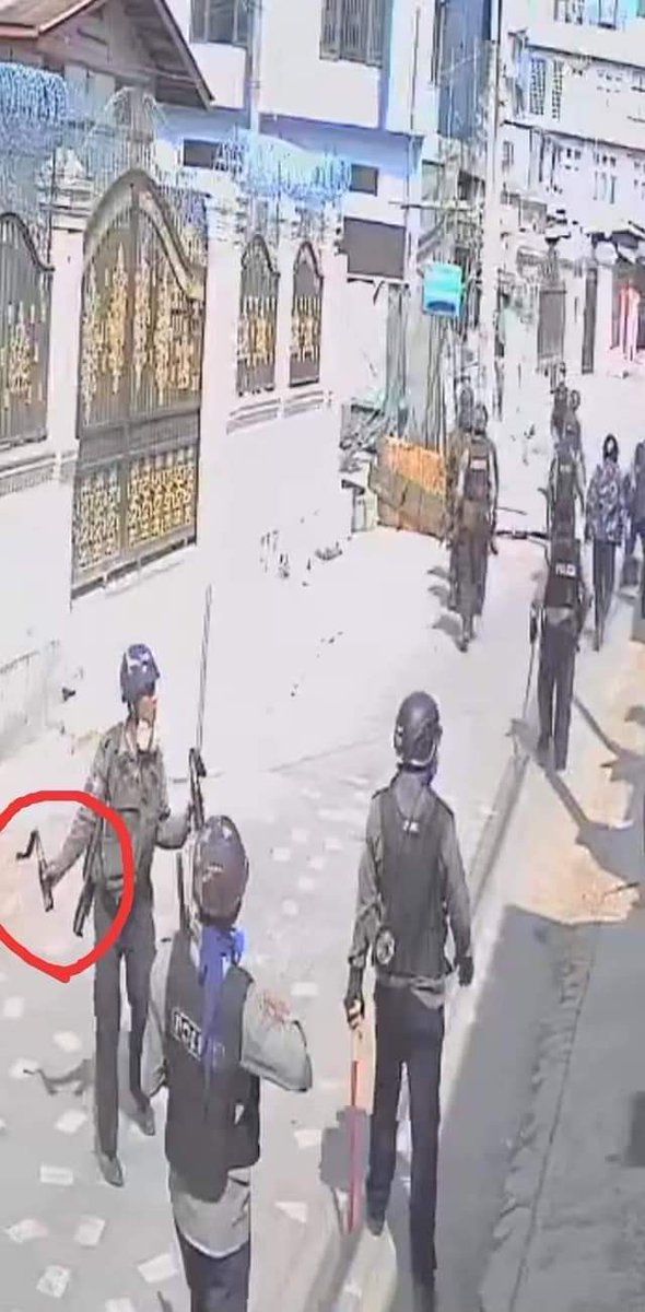 WathanO479's tweet photo. A terrorist policeman was throwing a molotov cocktail to peaceful protesters in TaungGyi today. 

#WhatIsHappeningInMyanmar 
#CrimesAgainstHumanity 
#SaveMyanmar https://t.co/Js7uj9dOL9