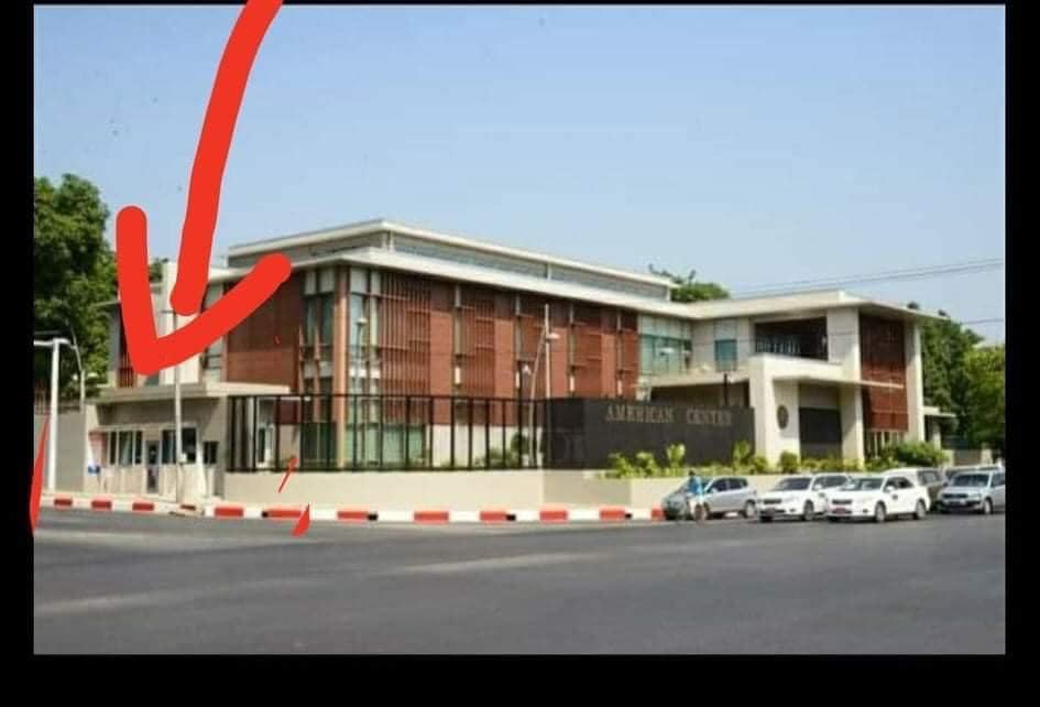 wkkaung's tweet photo. #US government's property, the American Center has been shot 4 times today at 2:26 PM (MMT) by a group of anonymous terrorists. The glass didn't explode due to the bulletproof glass. Waiting for the confirmation from US official and their response. #WhatsHappeninglnMyanmar https://t.co/GTPTcOvQq3