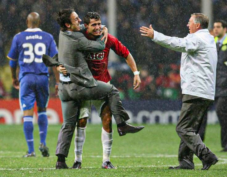Ronaldo is crying as Ferguson comes in for a hug. Anelka is in the background having missed the deciding penalty. Gary Neville is ecstatic, wearing a suit and not a full kit because that's what people who didn't play in the final should do.

It's a perfect photo. Moscow, 2008.
