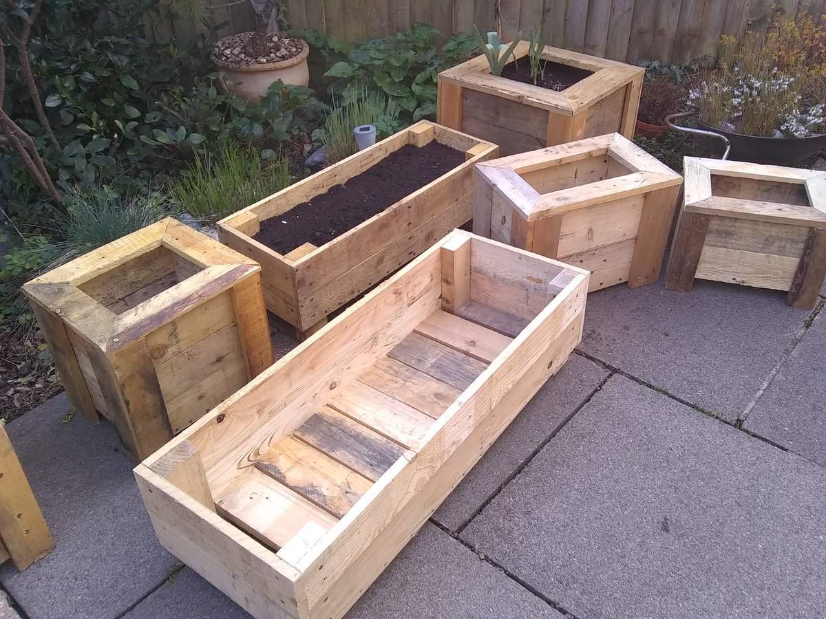 Busy day busting pallets.  #Spring #Garden #BeddingBoxes #Planters #Leatherhead #Pallets