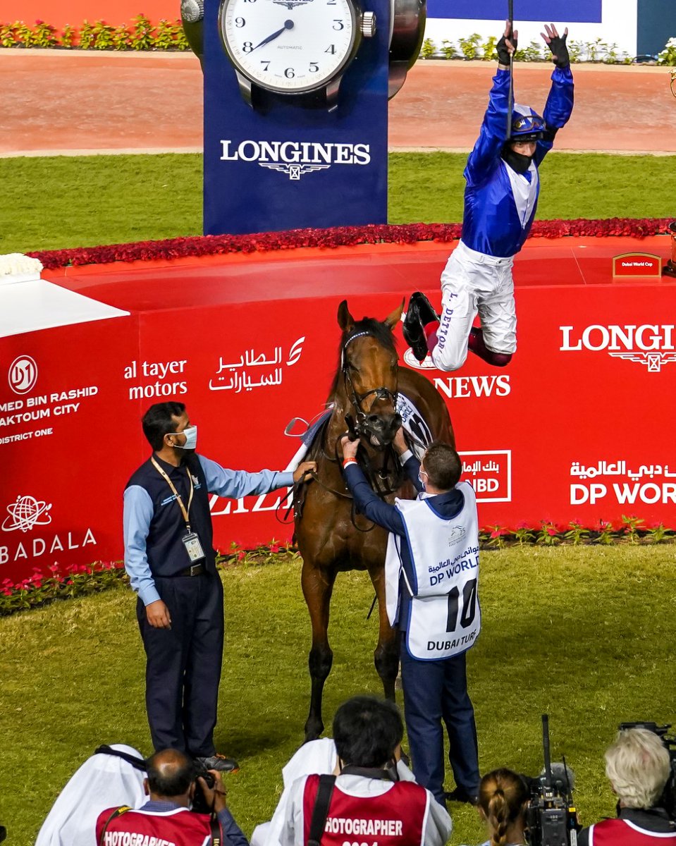 Thady Gosden and @FrankieDettori accept the trophies for the Dubai Turf Sponsored By @DP_World , from Mr. Abdulla Bin Damithan, Chief Commercial Officer -DP World UAE region at the 25th #DubaiWorldCup on March 27, 2021. #MeydanRacing