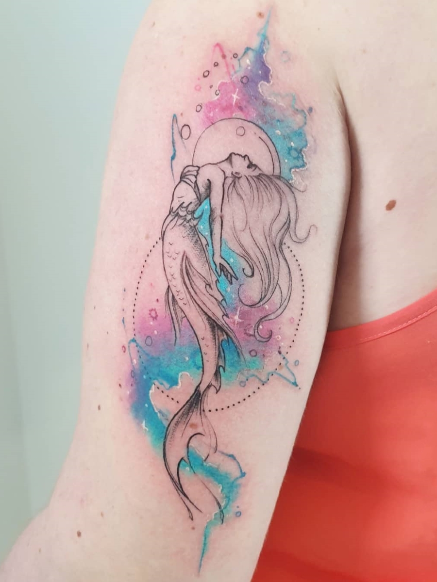 Watercolor style mermaid angel tattoo on the left side