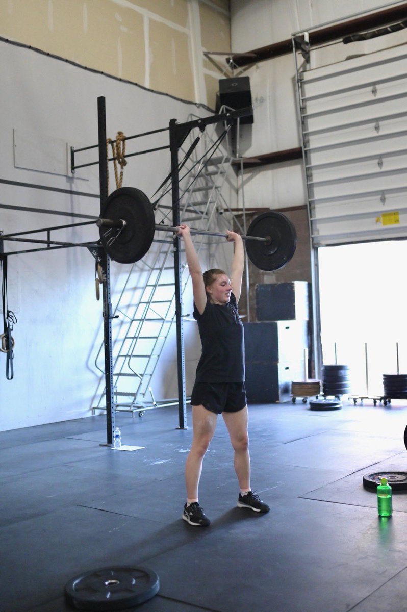 rairvin's tweet photo. Super proud mom moment. Sid taking on the last two Open wods yesterday. She got her first kipping pull ups in 21.3, did all 30, and 85# on her 21.4 complex. Getting more confident under the bar. #CrossFitOpen #barbellwork #buildingstregth #buildyourengine https://t.co/q0NRbuEzkk