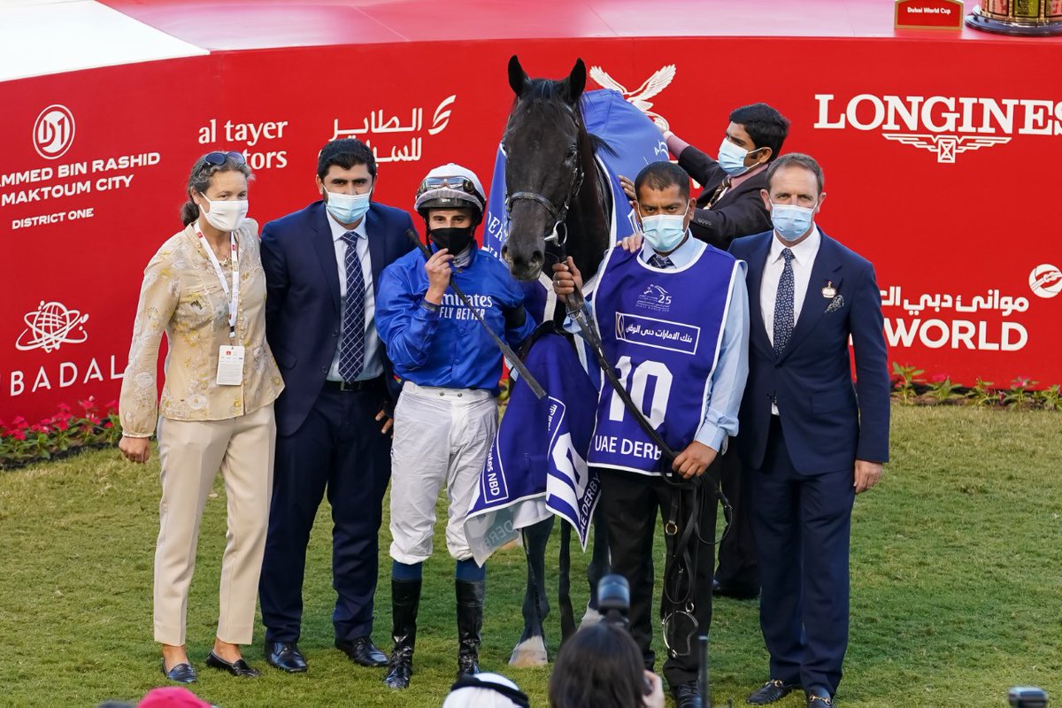 Sophie Chretien, Charlie Appleby and William Buick accept the trophies for the UAE Derby Sponsored By @EmiratesNBD_AE , from Hesham Abdulla Al Qassim- Vice Chairman and Managing Director, Emirates NBD at the 25th #DubaiWorldCup on March 27, 2021. #MeydanRacing