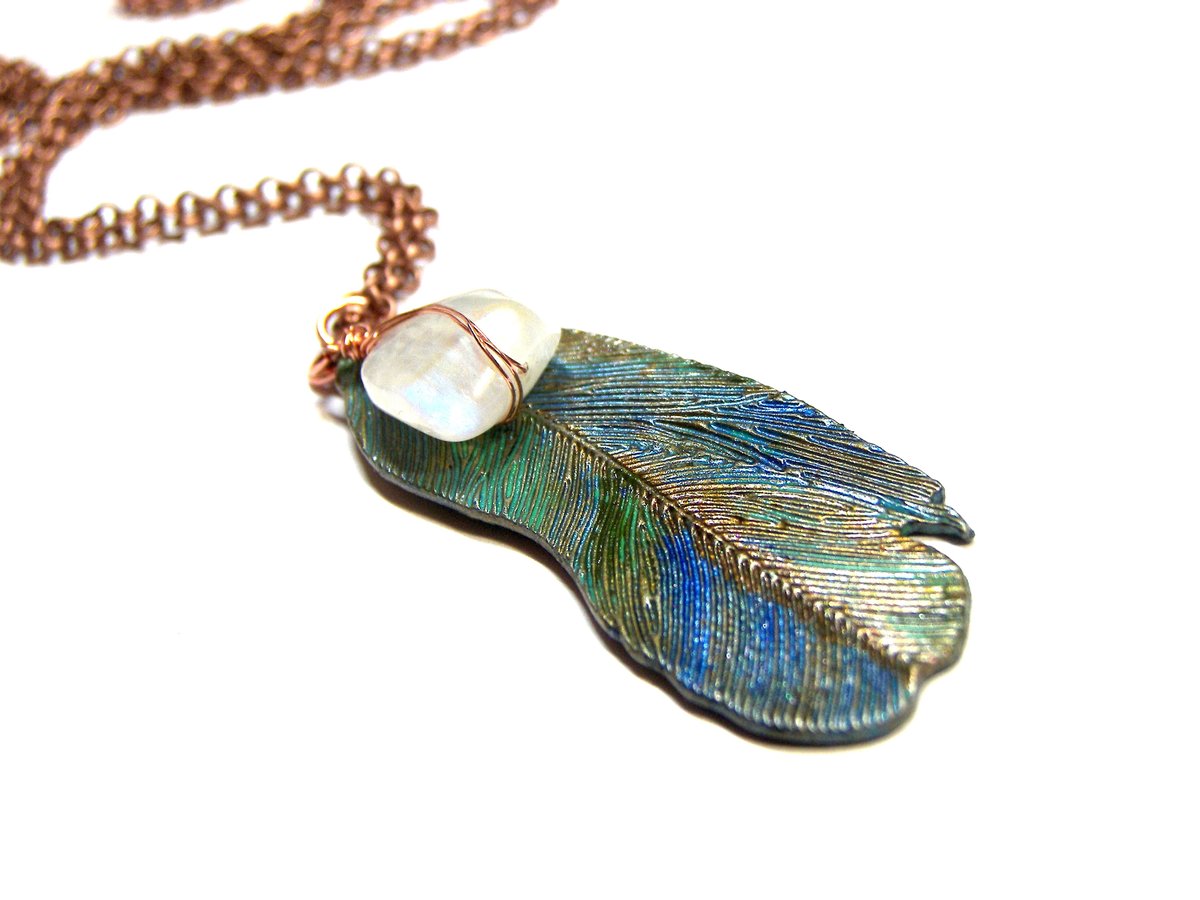 Peacock Feather Moonstone Pendant On Sale https://t.co/8m2sii6cRD #CosmicJewelry #Etsy #LunaEssence #giftforher #beadedjewelry #WomensJewelry #bohochicjewelry #BohemianJewelry #EverydayJewelry #handmadejewelry #SpiritualPendant https://t.co/tAHzLuA9Ty