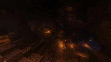 The inside of a large cave that splits off into two directions