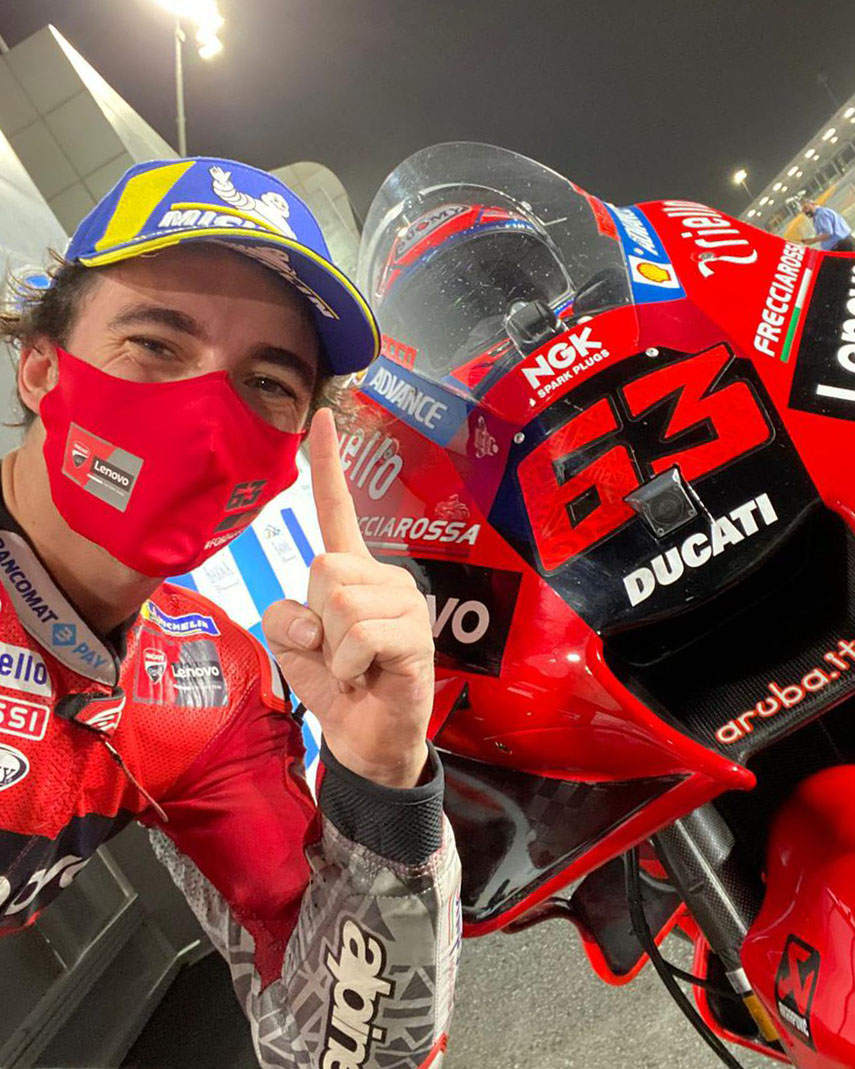 PeccoBagnaia's tweet photo. My first red pole position and circuit record lap 🔥 

1’52”722 

Today is a big day for us @ducaticorse 

#ForzaDucati #gofree https://t.co/qKpkFLmXN1
