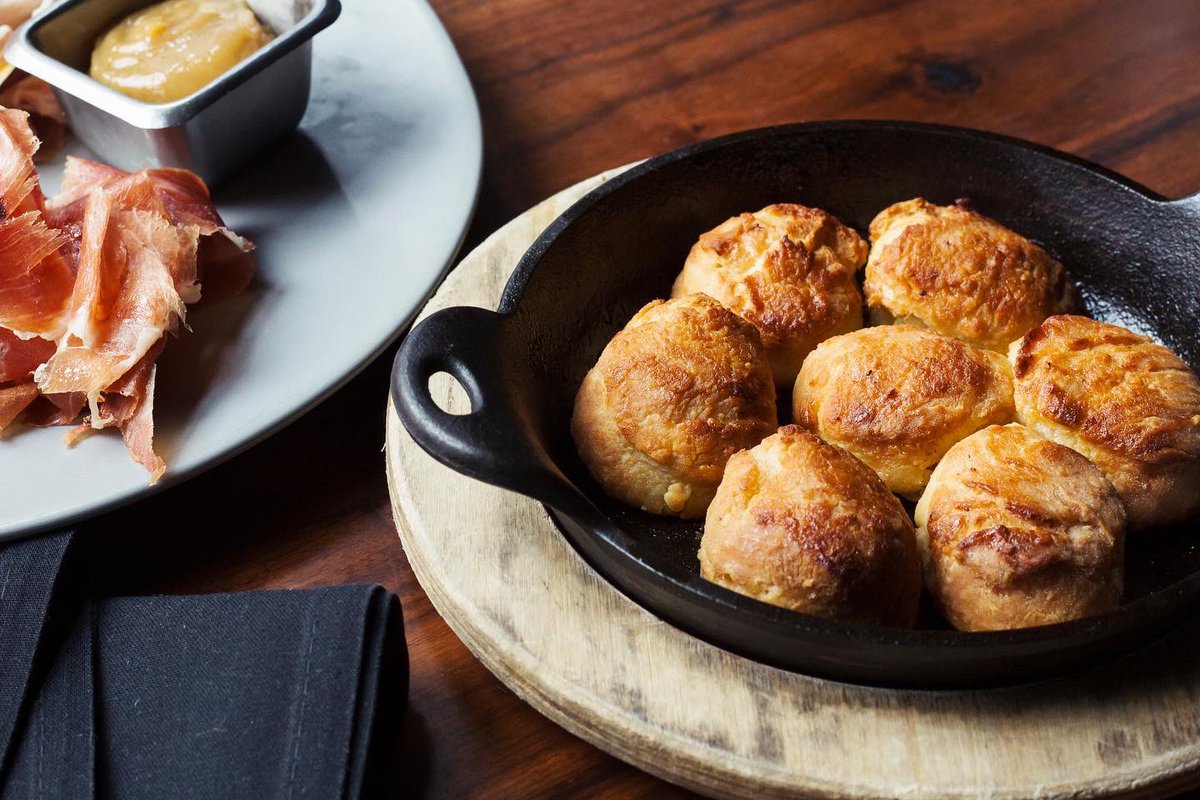 Our Ham Plate is perfect for enjoying while your entrée is on the way! Local benton’s ham with house flakey biscuits and our special whiskey jam